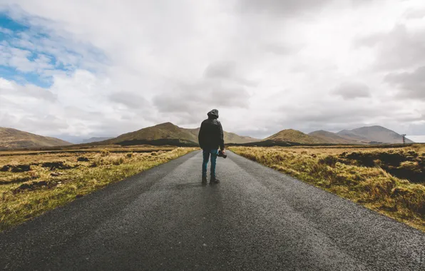 Picture road, field, hills, jeans, camera, shoes, hood, male