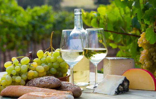 Wine, cheese, glasses, grapes, baguette