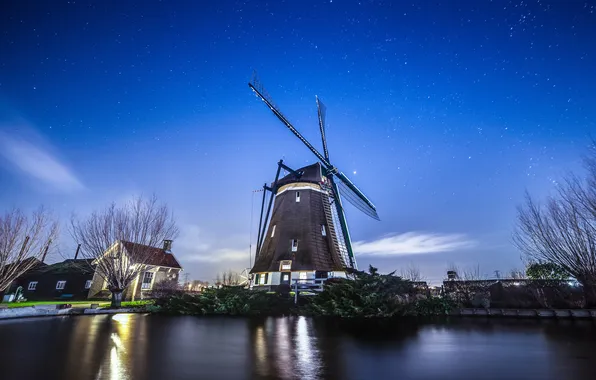 The sky, water, stars, windmill