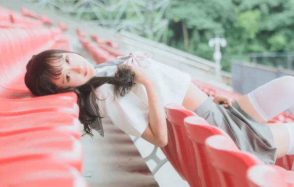 Model, Smile, Stadium, Woman, Lying Down, Sitting, Skirt, Uniform