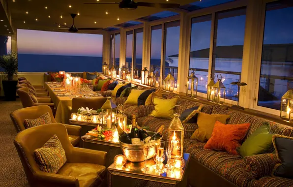 Picture the evening, candles, glasses, lights, the hotel, champagne, Australia, Twelve Apostles Hotel