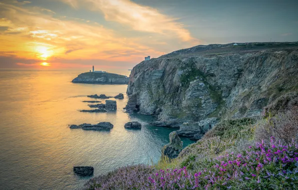 Picture lighthouse, England, North Wales, rock. sunset