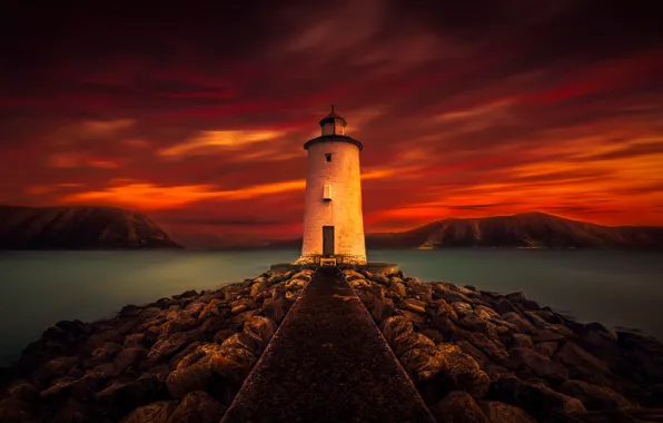 Picture sea, the sky, stones, lighthouse