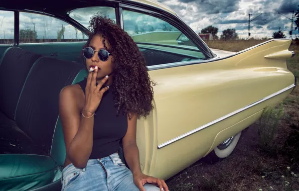 Auto, girl, jeans, cigarette