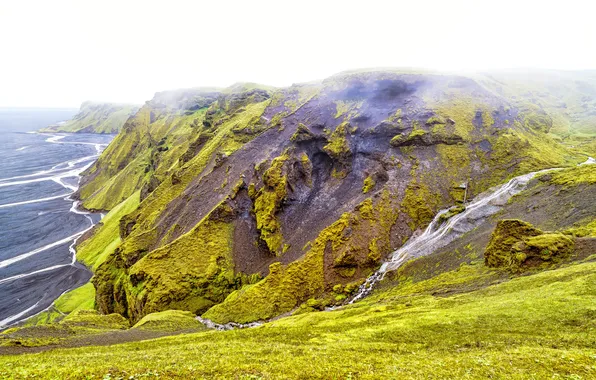 Sea, the sky, clouds, mountains, shore, haze