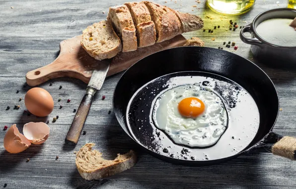 Bread, scrambled eggs, shell, pan