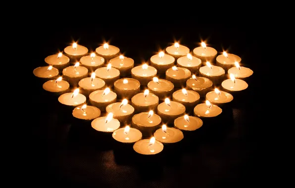 Picture candles, black background, heart