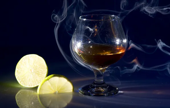 Picture lemon, smoke, glass, cognac, slices