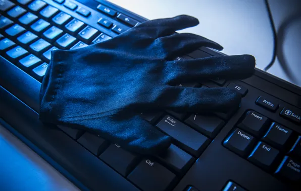 Picture gloves, keyboard, hackers, data theft