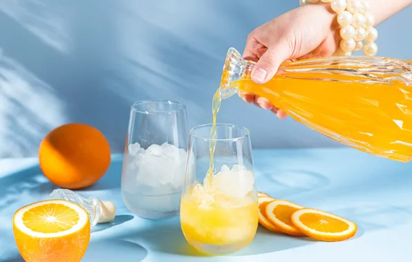 Glass, light, table, hand, ice, oranges, juice, shadows