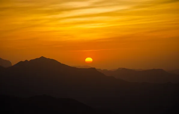 Picture clouds, sunset, mountains, silhouette, the sky is yellow