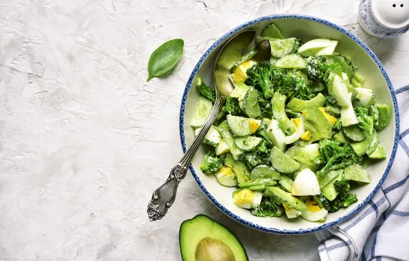 Eggs, plate, spoon, cucumbers, salad, avocado, broccoli