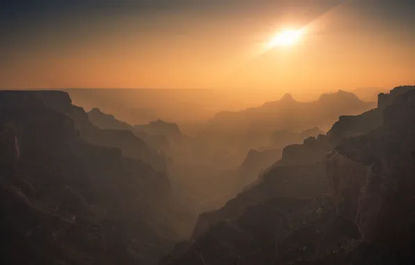 The sun, rays, light, mountains, fog, rocks, the slopes, tops
