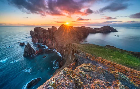 Sea, the sky, the sun, clouds, rays, sunset, mountains, stones