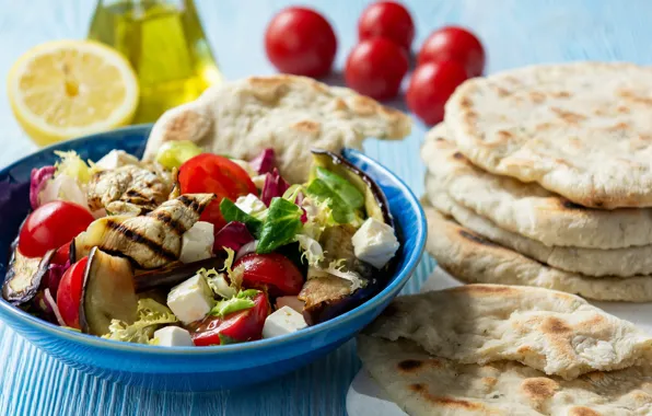 Lemon, oil, eggplant, tomatoes, salad, olives, feta, pellet