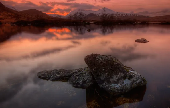 The sky, clouds, mountains, lake, stones, rocks, the evening