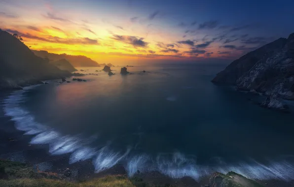 Sea, beach, the sky, clouds, sunset, yellow, stones, rocks