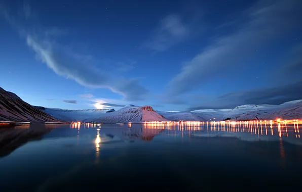 Picture the city, lights, lake, mountain, the evening