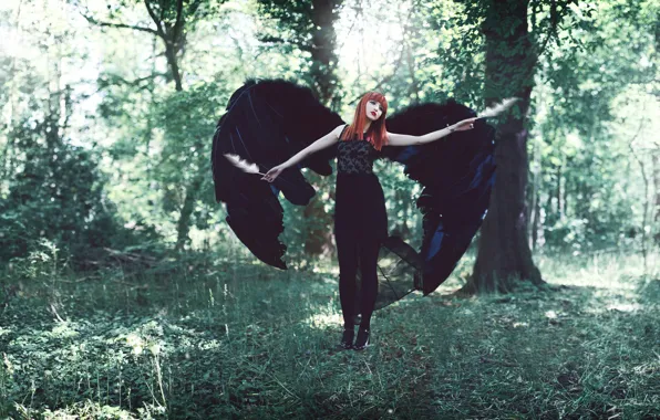 Picture wings, feathers, the red-haired girl