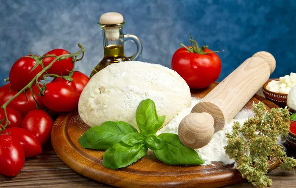 Oil, branch, tomatoes, flour, the dough, rolling pin