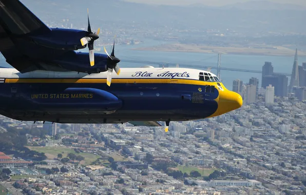 Picture the city, the plane, Lockheed, military transport, Hercules, Blue Angels, C-130, USMC