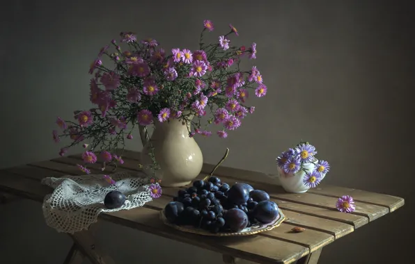 Grapes, plum, asters
