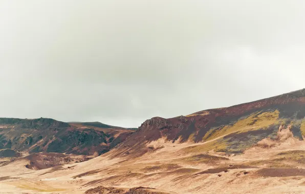 Valley, hill, gray clouds