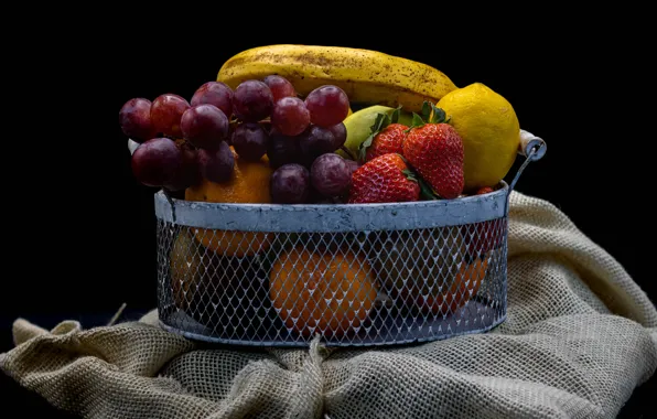 Mesh, lemon, strawberry, grapes, fruit, black background, banana, different