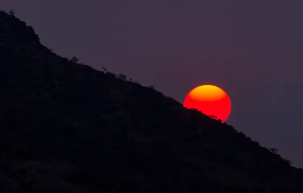 The sun, sunset, mountains, slope