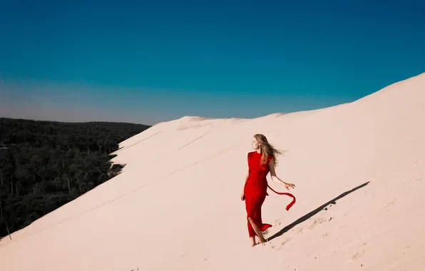Sand, girl, red dress