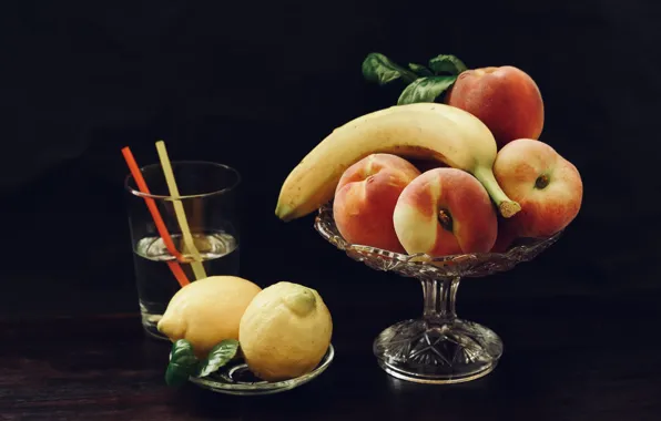 Still life, banana, peaches, lemons, vase