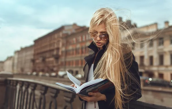 Picture girl, street, book, reads