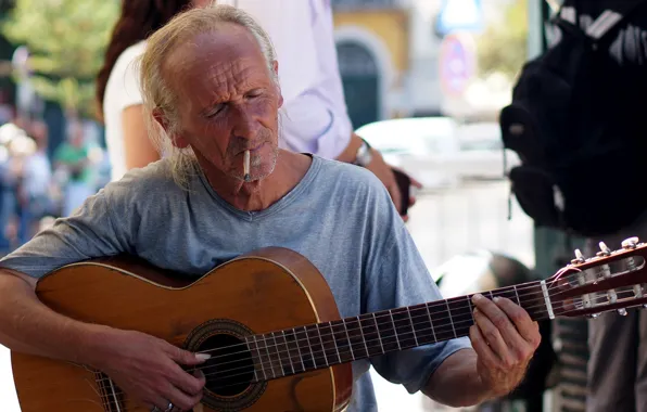 Picture street, people, guitar