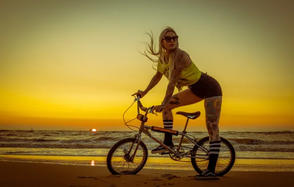 Picture sea, beach, girl, sunset, bike, pose, shorts, tattoo