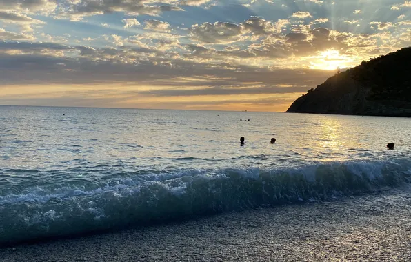 Sea, wave, the sun, clouds, pebbles, shore