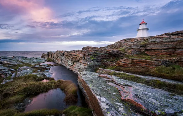 Sea, shore, lighthouse