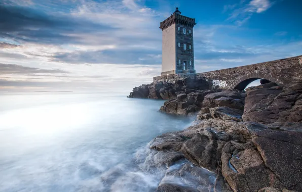 The sky, clouds, bridge, blue, rocks, shore, lighthouse, arch