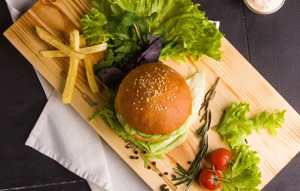 Board, tomatoes, sauce, hamburger, bun, salad, spices