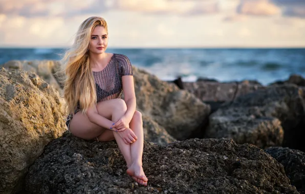 Picture sea, girl, face, stones, hair, blonde, legs, sitting