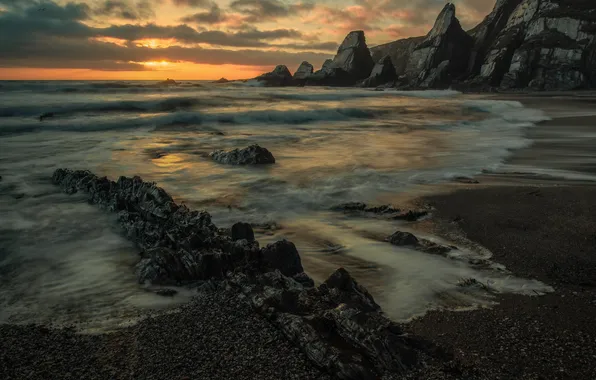 Sea, clouds, sunset, mountains, rocks, shore, surf, rocky ridge
