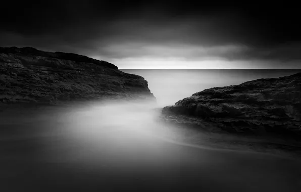 Sea, water, clouds, rocks, the darkness, black and white