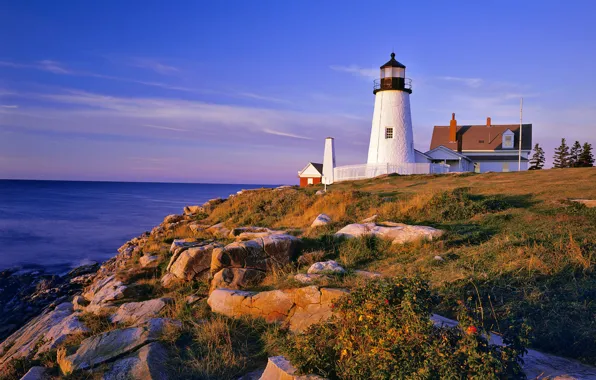 Sea, stones, lighthouse, hill