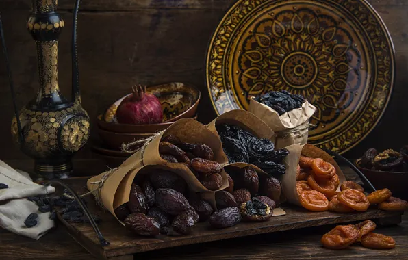 Tray, dried apricots, dried fruits, prunes, dates