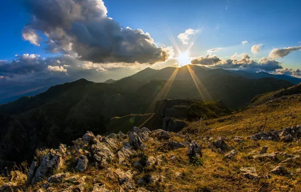The sun, clouds, mountains, Italy