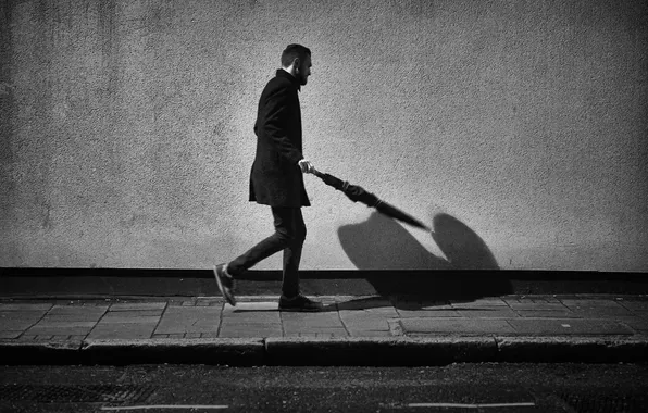 Umbrella, wall, shadow, male, the sidewalk, walking, city