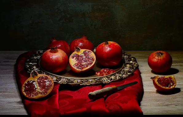 The dark background, table, knife, fabric, still life, grenades, tray