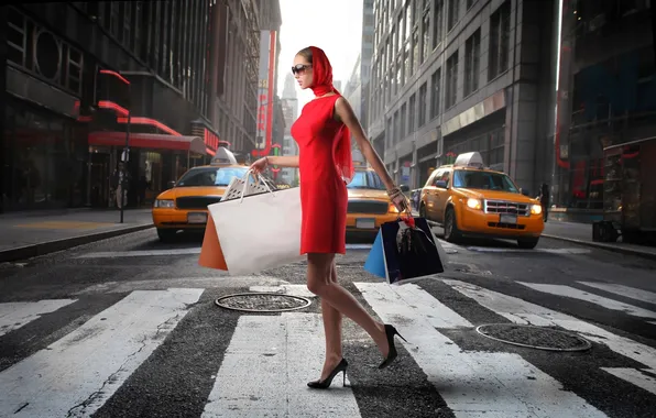 Picture girl, in red with packages in hands