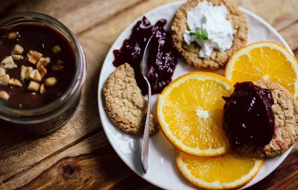 Board, oranges, cookies, plate, spoon, Bank, nuts, cream
