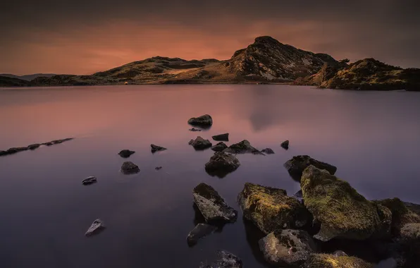 The sky, sunset, mountains, lake, stones