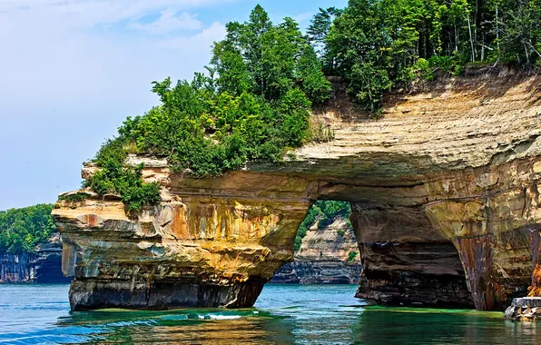 Sea, trees, lake, rocks, arch